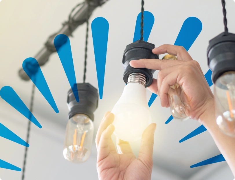 Image of hands changing a light bulb with the Secure Horizon logo icon in the background.